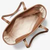 An overhead view of the inside of a brown leather tote bag. Produktbild-Vorschau