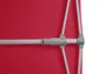 A close-up view of the structural components of a red umbrella, showing the pole and connecting joints. Produktbild-Vorschau