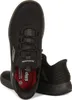 A pair of black Skechers shoes are shown from a slightly elevated angle, with one shoe in the foreground and the other behind it. Voir les images du produit