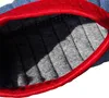 A close-up view of the inside of a garment, showing stitching and material texture. Produktbild-Vorschau