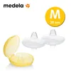 A product shot of Medela Contact Nipple Shields with a storage box and a size indicator. Anteprima dell’immagine prodotto