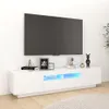 A white TV stand with a television on top, in a room with a white wall and wooden floor. Produktbild-Vorschau