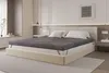 A bedroom scene with a bed featuring the product. Náhľad obrázku produktu