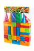 A set of colorful building blocks in a plastic bag, with a promotional banner at the top showing a child playing with blocks. Podgląd zdjęcia produktu