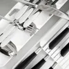 A close-up, angled view of a cutlery organizer with various pieces of silverware arranged in its compartments. Anteprima dell’immagine prodotto
