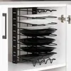 A kitchen organizer with plates stacked inside, placed inside a cabinet. Anteprima dell’immagine prodotto