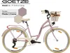 A pink city bike with a basket and cream-colored accents, presented on a white background with text and color swatches. Produktbild-Vorschau