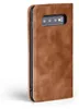 A brown flip cover phone case is shown against a white background. Produktbild-Vorschau