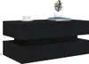 A black coffee table with LED lights, a white cup and saucer, and a small potted plant on top. Náhled obrázku produktu