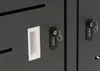 Close-up of two combination locks and a handle on a dark gray surface, likely a locker or cabinet. Náhled obrázku produktu