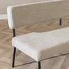 Close-up of a bench with a fabric seat and backrest, supported by black metal legs, on a wooden floor. Produktbild-Vorschau