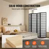 A bedroom scene with a bed and a folding room divider, with close-up shots of wood grain and feature icons. Voir les images du produit
