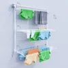 A vertical wall-mounted clothes drying rack with multiple tiers, loaded with laundry. Produktbild-Vorschau