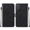 A black flip-style phone case for a Redmi Note 11 Pro is shown open, displaying both the inside and outside of the case.