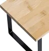 A close-up view of a shelf made of bamboo with a black metal frame. Produktbild-Vorschau