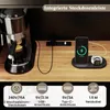 A close-up view of a coffee machine and a charging station with a phone and smartwatch, set against a wooden surface and a dark background. Náhľad obrázku produktu
