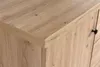 A close-up view of the corner of a wooden cabinet or dresser. Produktbild-Vorschau