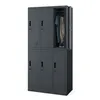A gray metal locker unit with six compartments, one of which is open showing clothes and shoes inside. Produktbild-Vorschau
