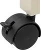 Close-up of a black caster wheel with a lever, attached to a beige object. Náhľad obrázku produktu