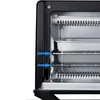 A close-up view of the interior of a black mini oven, showing the racks and baking trays. Produktbild-Vorschau