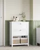 A white bathroom cabinet with two drawers and an open shelf with two woven baskets. Náhled obrázku produktu