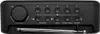 Top view of a black digital radio with buttons and an antenna. Voir les images du produit