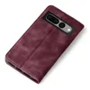 A burgundy flip case for a Google Pixel 7 Pro is shown from a diagonal top-down view on a white background. Produktbild-Vorschau