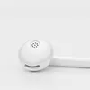 A close-up, studio shot of a white in-ear earbud on a white background. Produktbild-Vorschau