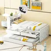 A white daybed with a trundle bed and storage drawers, set up in a bedroom with decorative items. Podgląd zdjęcia produktu