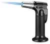 A black and silver butane torch lighter with a blue flame emitting from the nozzle, set against a white background. Náhled obrázku produktu