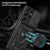 A black phone case with a ring holder and camera cover is shown attached to a car vent mount. Produktbild-Vorschau