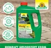 A green plastic bottle of Neudorff BioKraft Grundstoff Essig weed killer, with various marketing labels and badges on the left side, placed on a stone patio. Produktbild-Vorschau