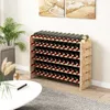 A wooden wine rack filled with bottles of wine, placed in a room with a plant and a table. Produktbild-Vorschau