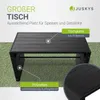 A black polyrattan table with a polywood tabletop, shown outdoors on a grassy surface. Produktbild-Vorschau