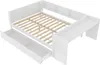 A white wooden bed frame with drawers and a desk attachment, shown from a diagonal top-down view. Náhled obrázku produktu