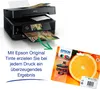 A printer is shown printing a photo, with a pack of Epson ink cartridges next to it. Náhled obrázku produktu