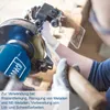 A person is using a grinding machine. Náhľad obrázku produktu