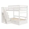A white bunk bed with stairs and a drawer, shown against a white background. Náhled obrázku produktu