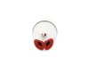 A top-down view of a white faucet cartridge with red seals. Produktbild-Vorschau