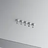A close-up view of the control panel of a range hood, showing five buttons with icons. Náhled obrázku produktu