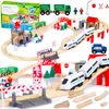 A wooden train set with various accessories arranged on a wooden track. Náhled obrázku produktu