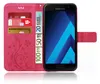 A pink flip case for a Samsung phone, with cards and euro banknotes inserted. Produktbild-Vorschau