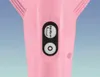 A close-up view of the controls on a pink electronic device, likely a vacuum cleaner, against a blue and white background. Podgląd zdjęcia produktu