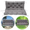 A collage showing a gray tufted bench cushion, a swing with the cushion on a beach, and a swing with the cushion in a garden. Produktbild-Vorschau