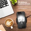 A flat lay of a laptop, coffee, and a smartphone charging on a wireless charger, with German text overlay. Produktbild-Vorschau