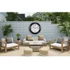 An outdoor patio scene with furniture and a large wall clock. Produktbild-Vorschau