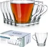 A set of clear glass drinking glasses filled with tea, shown with their packaging. Voir les images du produit