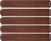 Five identical brown metal garden edging pieces are laid out horizontally against a white background. Voir les images du produit