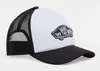 A Vans trucker cap with a white front and black mesh back, featuring the Vans logo. Produktbild-Vorschau
