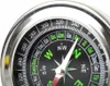 A close-up view of a compass face. Produktbild-Vorschau